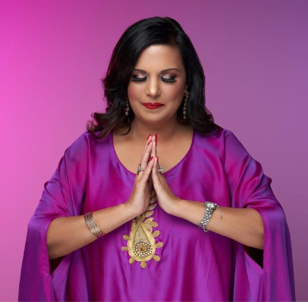 Photograph of Alka Vaswani in a Purple top